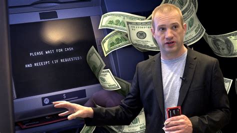 Watch these hackers crack an ATM in seconds .